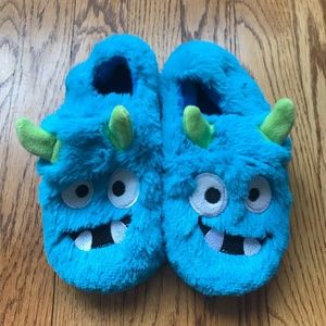 Fuzzy monster slippers, size toddler 11